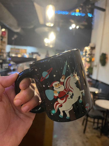 Santa Riding a Unicorn in Space Mug